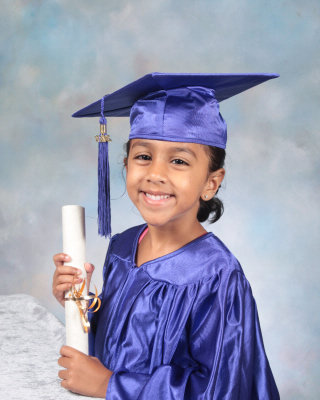 girl holding her diploma